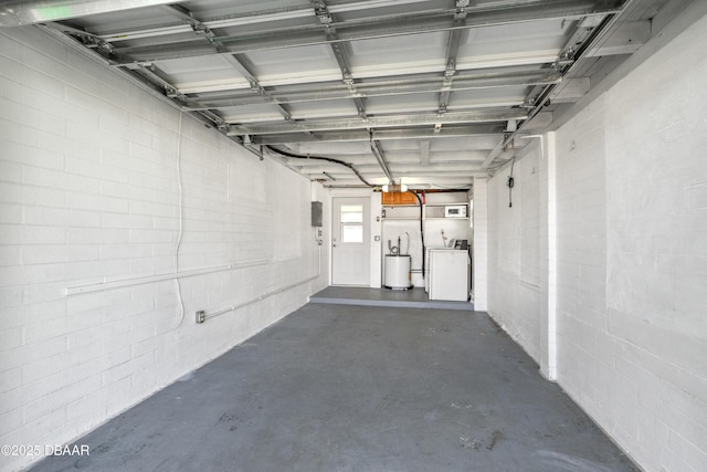 garage featuring washing machine and dryer