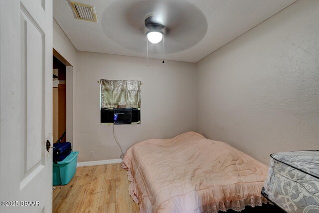 326 Jefferson St, Daytona Beach, FL 32114 - bedroom featuring light wood-type flooring, baseboards, and ceiling fan