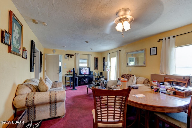 326 Jefferson St, Daytona Beach, FL 32114 - carpeted dining area with ceiling fan and a textured ceiling