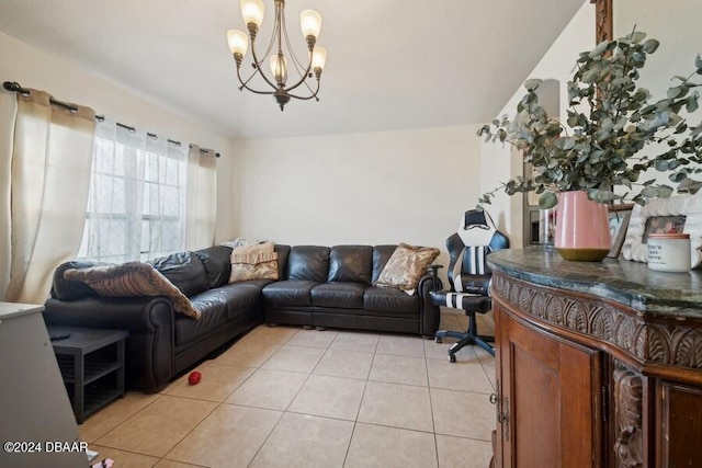 tiled living room with an inviting chandelier