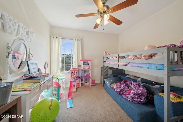 carpeted bedroom featuring ceiling fan