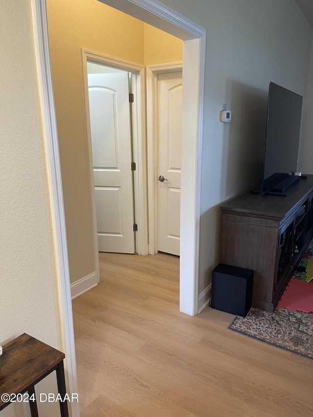 hallway featuring light wood-type flooring