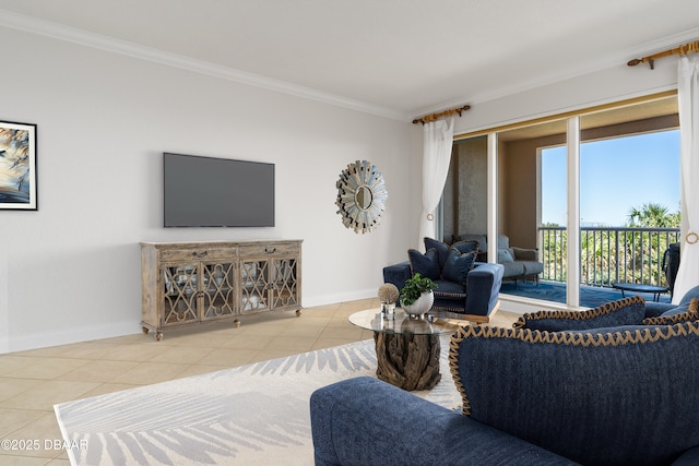 living area featuring tile patterned flooring, crown molding, and baseboards