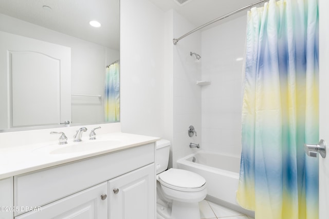 full bath featuring tile patterned flooring, toilet, vanity, and shower / tub combo