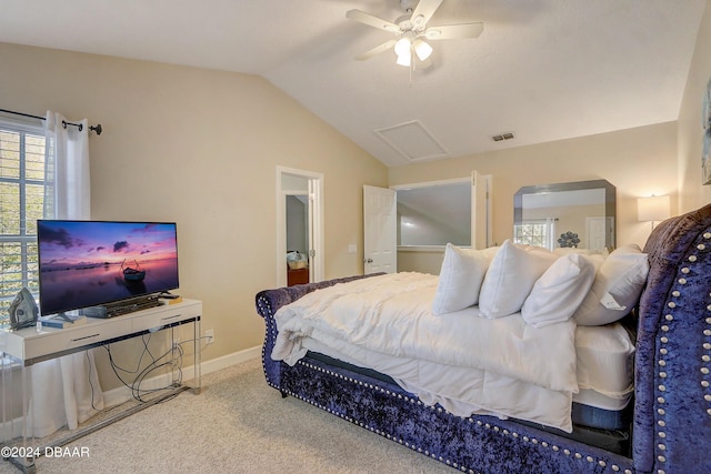 bedroom featuring visible vents, baseboards, attic access, lofted ceiling, and carpet floors