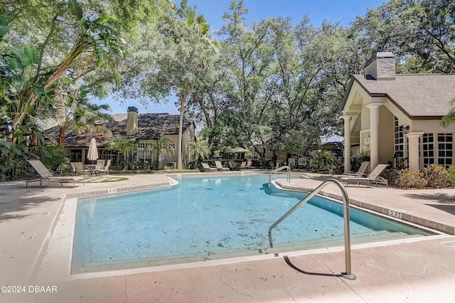 pool with a patio