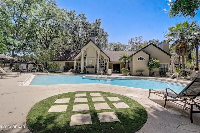 community pool featuring a patio