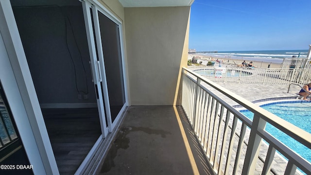 219 S Atlantic Ave Unit 120, Daytona Beach, FL 32118 - balcony with a beach view and a water view