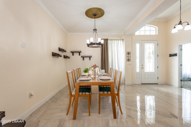 26 Ethel Ln, Palm Coast, FL 32164 - dining area featuring baseboards, an inviting chandelier, and crown molding