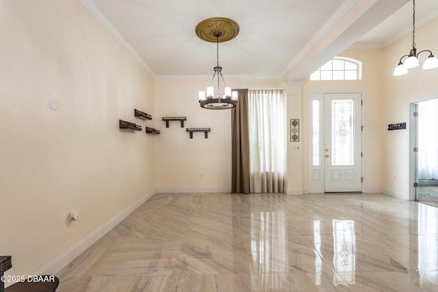 26 Ethel Ln, Palm Coast, FL 32164 - foyer entrance featuring an inviting chandelier, baseboards, and crown molding