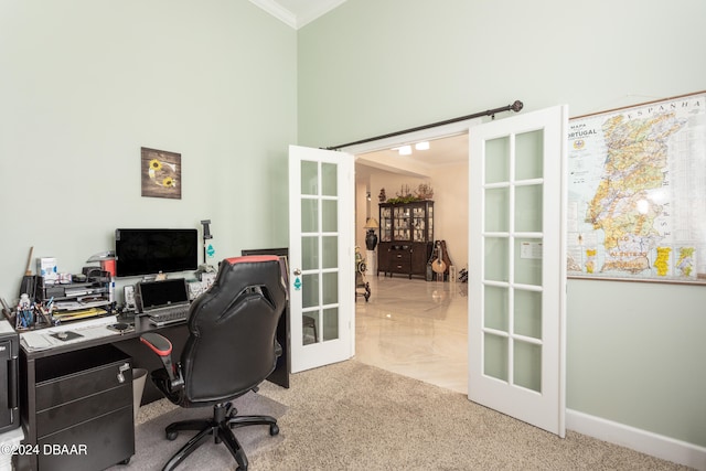 home office featuring french doors, light colored carpet, and crown molding