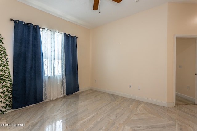 26 Ethel Ln, Palm Coast, FL 32164 - spare room featuring a ceiling fan and baseboards
