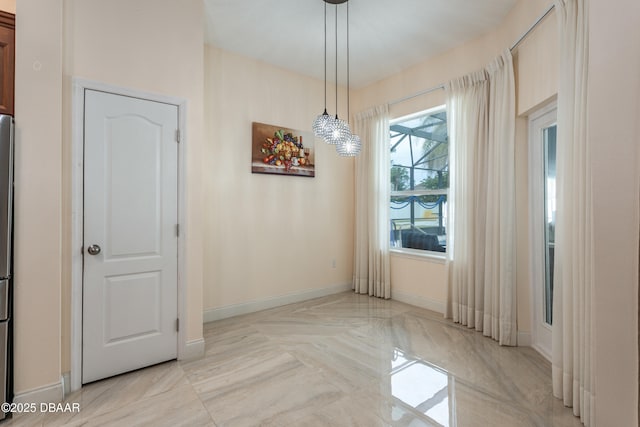 26 Ethel Ln, Palm Coast, FL 32164 - unfurnished dining area with baseboards