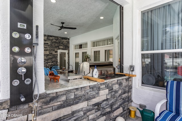 view of patio / terrace with ceiling fan