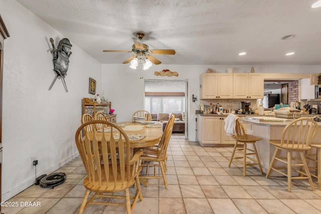 327 Due E St, New Smyrna Beach, FL 32169 - dining space featuring ceiling fan, light tile patterned flooring, and recessed lighting