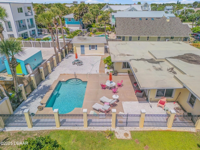 327 Due E St, New Smyrna Beach, FL 32169 - community pool featuring a patio and a residential view