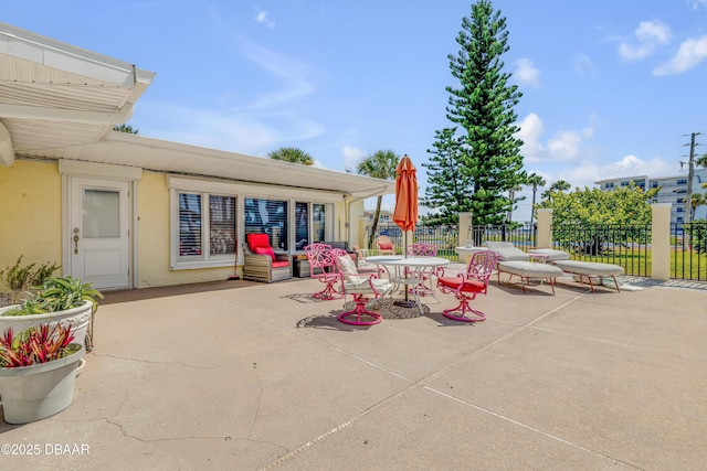 327 Due E St, New Smyrna Beach, FL 32169 - view of patio featuring outdoor dining space