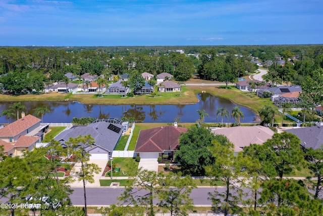 aerial view with a residential view and a water view