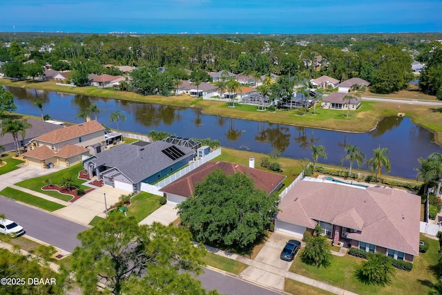 birds eye view of property featuring a residential view and a water view