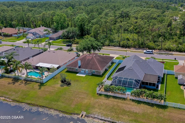aerial view with a forest view and a residential view