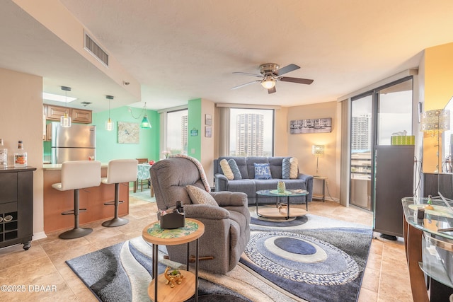 living room with ceiling fan