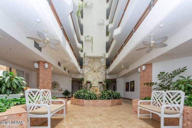 view of patio featuring ceiling fan