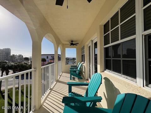 610 S Atlantic Ave, New Smyrna Beach, FL 32169 - balcony featuring a ceiling fan