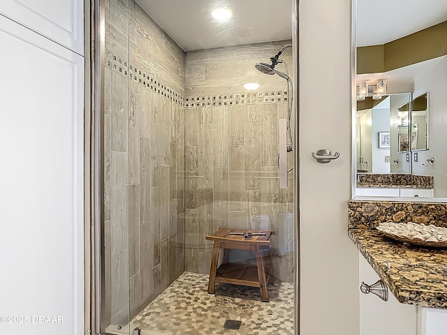 2055 S Atlantic Ave S Unit 1410, Daytona Beach, FL 32118 - bathroom with a shower stall and vanity
