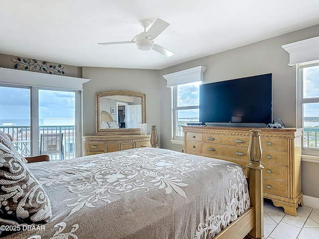 2055 S Atlantic Ave S Unit 1410, Daytona Beach, FL 32118 - bedroom featuring access to outside, light tile patterned floors, and a ceiling fan