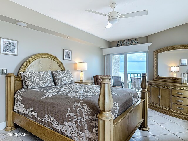 2055 S Atlantic Ave S Unit 1410, Daytona Beach, FL 32118 - bedroom featuring access to outside, light tile patterned floors, and a ceiling fan