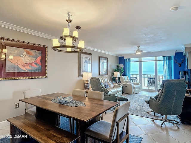2055 S Atlantic Ave S Unit 1410, Daytona Beach, FL 32118 - dining area featuring light tile patterned flooring, ornamental molding, a ceiling fan, and a chandelier
