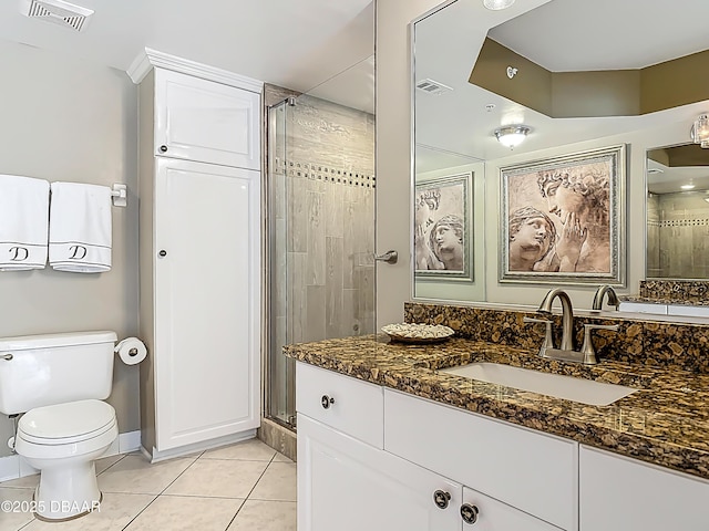 2055 S Atlantic Ave S Unit 1410, Daytona Beach, FL 32118 - full bath with vanity, a stall shower, and tile patterned floors