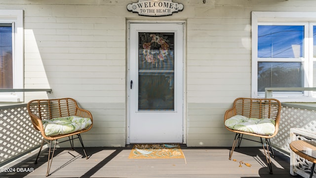 doorway to property featuring a deck