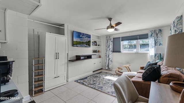 131 Mitchell Pl, Daytona Beach, FL 32118 - living room with light tile patterned flooring and ceiling fan