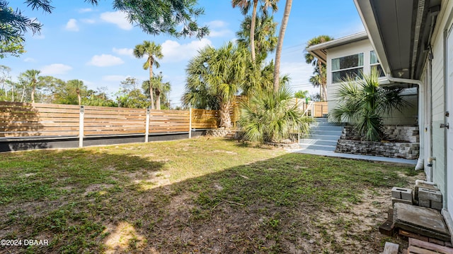 131 Mitchell Pl, Daytona Beach, FL 32118 - view of yard featuring stairs