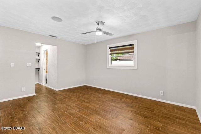 32 Twin River Dr, Ormond Beach, FL 32174 - spare room with baseboards, a ceiling fan, wood finished floors, and visible vents
