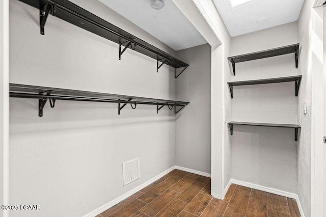 32 Twin River Dr, Ormond Beach, FL 32174 - spacious closet featuring visible vents and wood finished floors