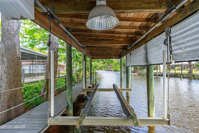 32 Twin River Dr, Ormond Beach, FL 32174 - dock area with a water view and boat lift