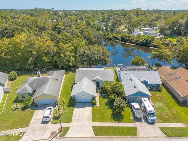3836 Long Grove Ln, Port Orange, FL 32129 - aerial view of residential area featuring a large body of water and a heavily wooded area