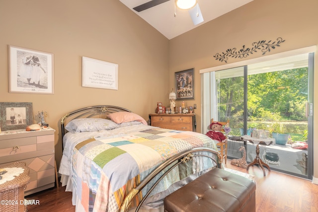 bedroom featuring hardwood / wood-style floors, ceiling fan, and vaulted ceiling