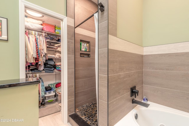 bathroom with plus walk in shower