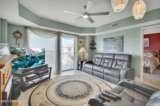 4670 Links Village Dr Unit B706, Ponce Inlet, FL 32127 - living area with visible vents, ceiling fan, and baseboards