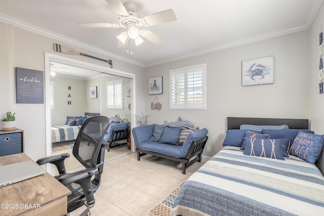 bedroom featuring crown molding, tile patterned floors, a closet, and ceiling fan