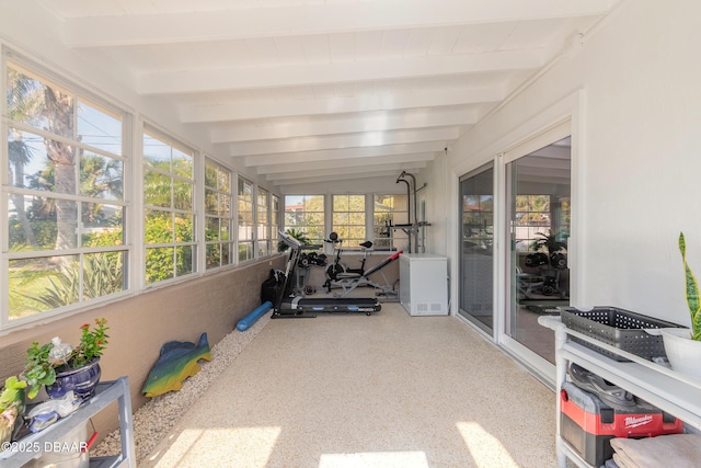 sunroom with beamed ceiling