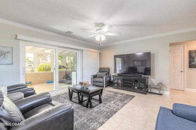 tiled living room featuring ornamental molding and ceiling fan