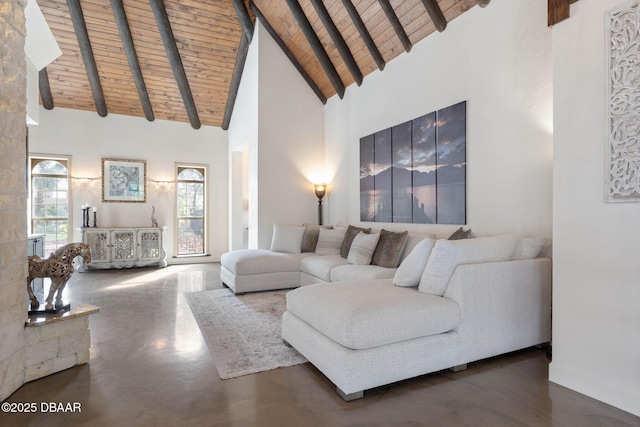 living room with beamed ceiling, high vaulted ceiling, and wood ceiling