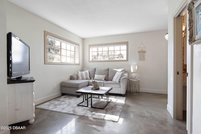 living room with concrete flooring