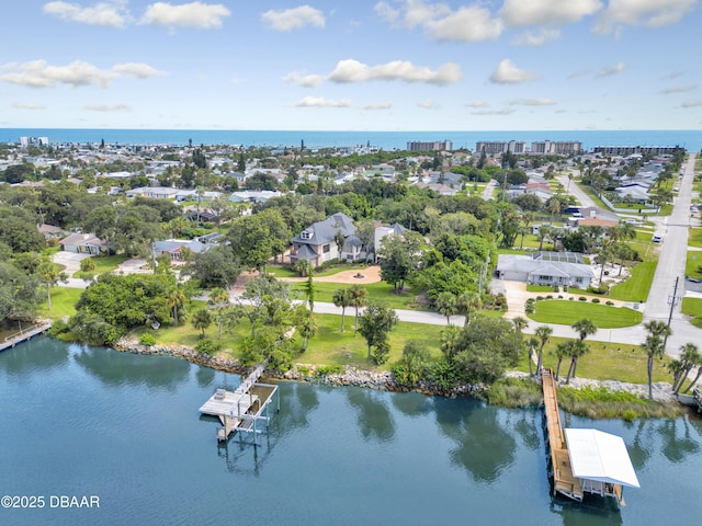 drone / aerial view with a water view