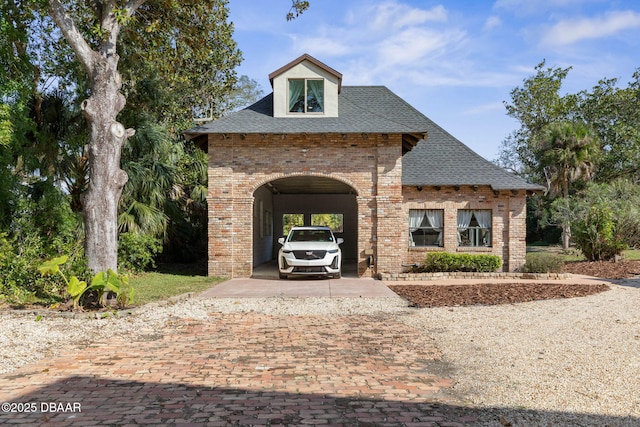 view of front of home featuring a carport