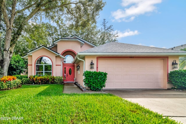 ranch-style house featuring a garage, concrete driveway, roof with shingles, stucco siding, and a front yard